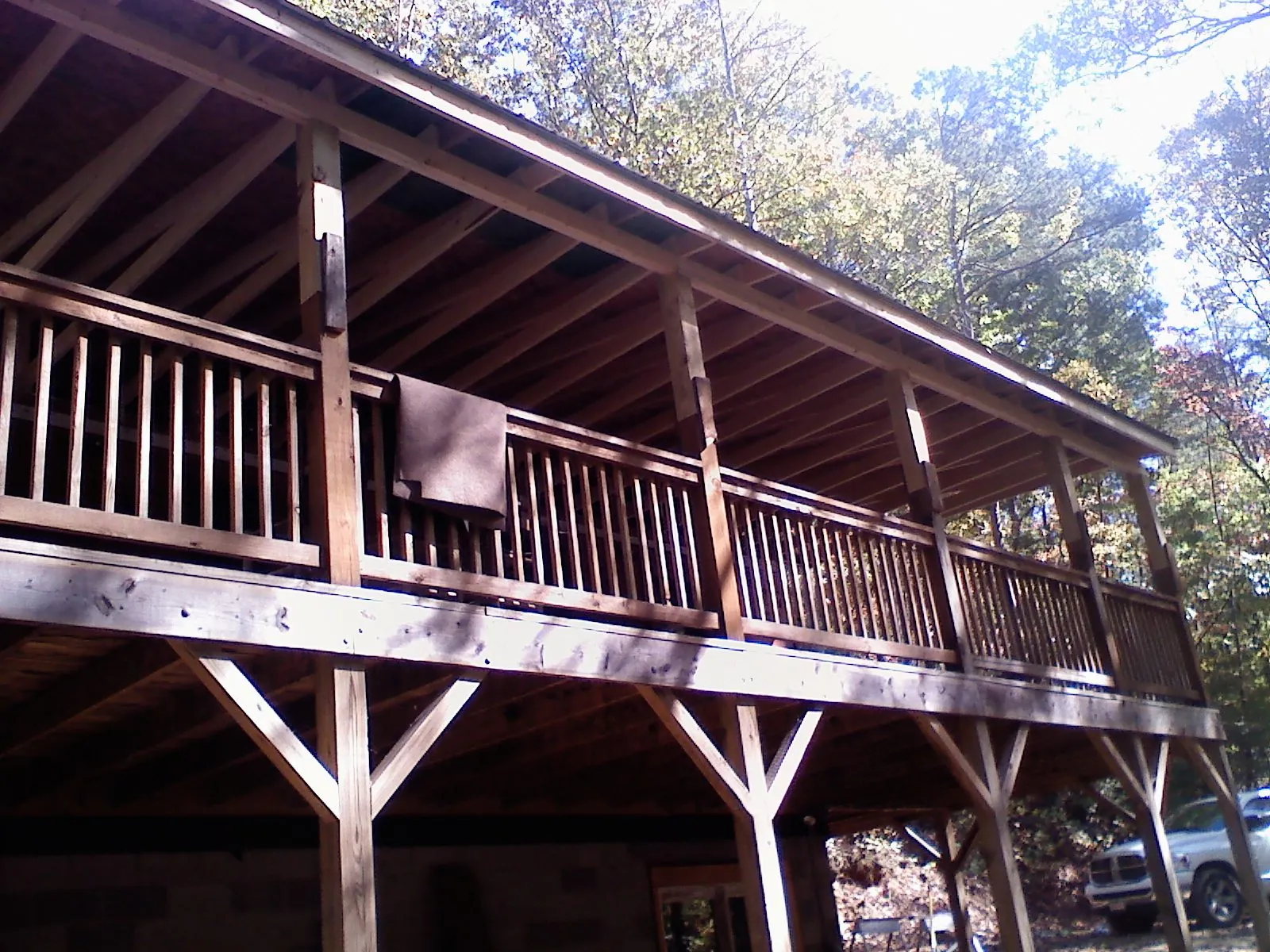 Timber framing under a new elevated porch and deck — Roof Leak Repair in Federal Way by Roofing Brothers